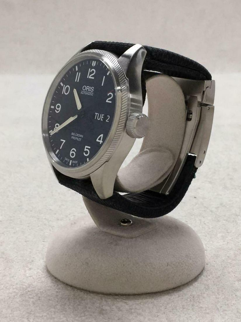 ORIS Big Crown Self-winding Analog Canvas Black Stainless Men's Watch: ORIS Big Crown Self-winding Analog Canvas Black Stainless Men's Watch Brand: Oris Type: Wristwatch Department: Mens Pre-Owned The BIDHAUS Guarantee: All items in this auction are guaranteed authentic
