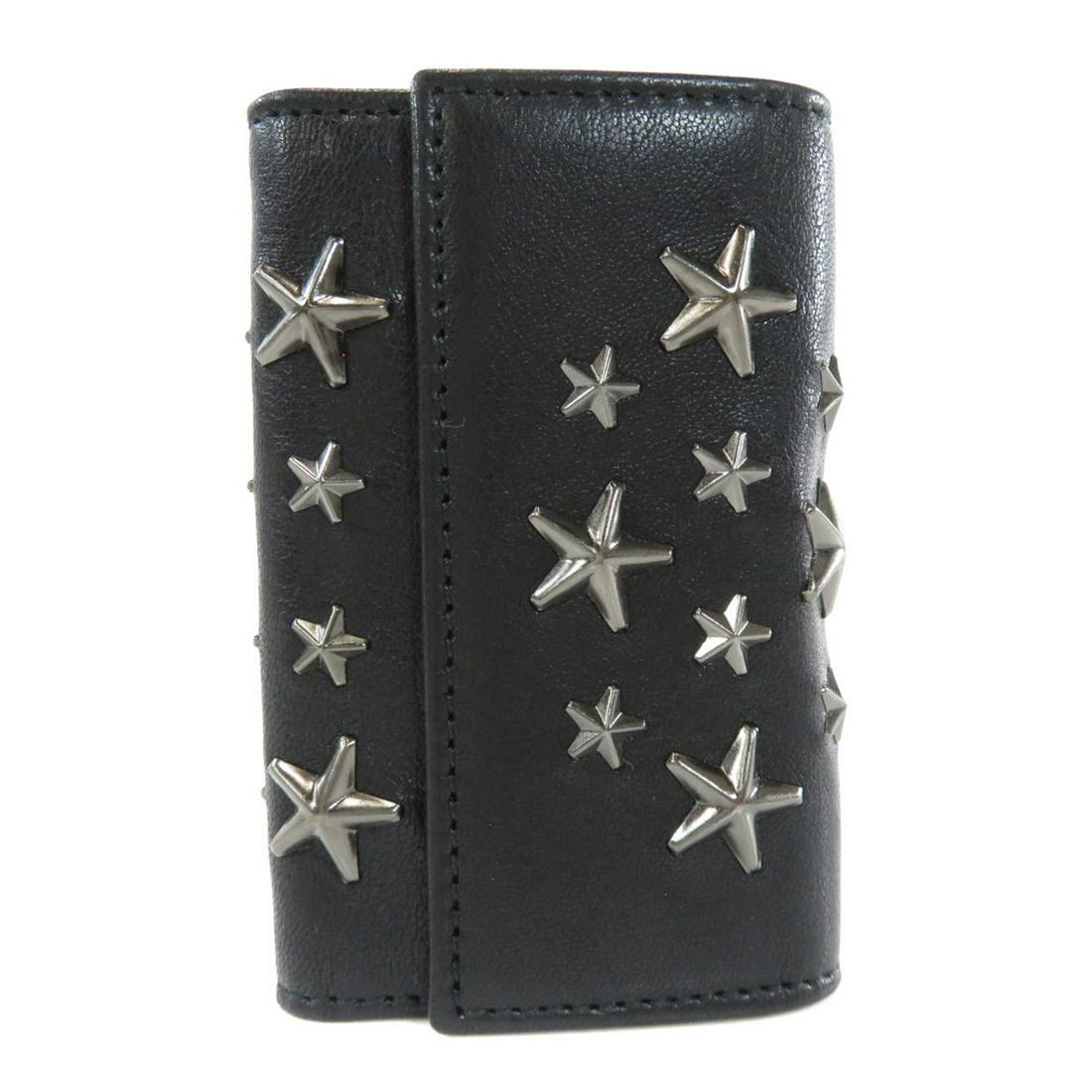 Jimmy Choo Star Studs Key Case Leather Ladies: Jimmy Choo Star Studs Key Case Leather Ladies Brand: Jimmy Choo Type: Keycase Color: Black Gender: Women Closure: Snap fastener Material: Leather Leather: Keyring: Yes Number of Key Hooks: 6 Inner Poc