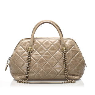 Chanel Matelasse Lambskin Leather Satchel: Chanel Matelasse Lambskin Leather Satchel This satchel features a quilted lambskin leather body rolled leather top handles curb chain straps a top zip closure and interior zip and slip pockets. 