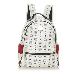 MCM Visetos Stark Leather Backpack: MCM Visetos Stark Leather Backpack The Stark backpack features a leather body an exterior front zip pocket exterior side slip pockets a flat leather top handle flat back straps a top zip