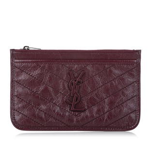 Saint Laurent Niki Bill Pouch: Saint Laurent Niki Bill Pouch This clutch bag features a quilted leather body a top zip closure and an interior slip pocket. Brand: Saint Laurent Model: Niki Bill Pouch Origin: Italy Category: