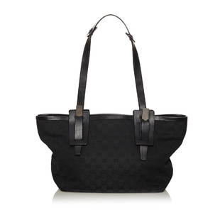 Gucci GG Canvas Shoulder Bag: Gucci GG Canvas Shoulder Bag This shoulder bag features a canvas body with leather trim flat leather straps an open top and an interior zip pocket. Brand: Gucci Model: GG Canvas Shoulder Bag