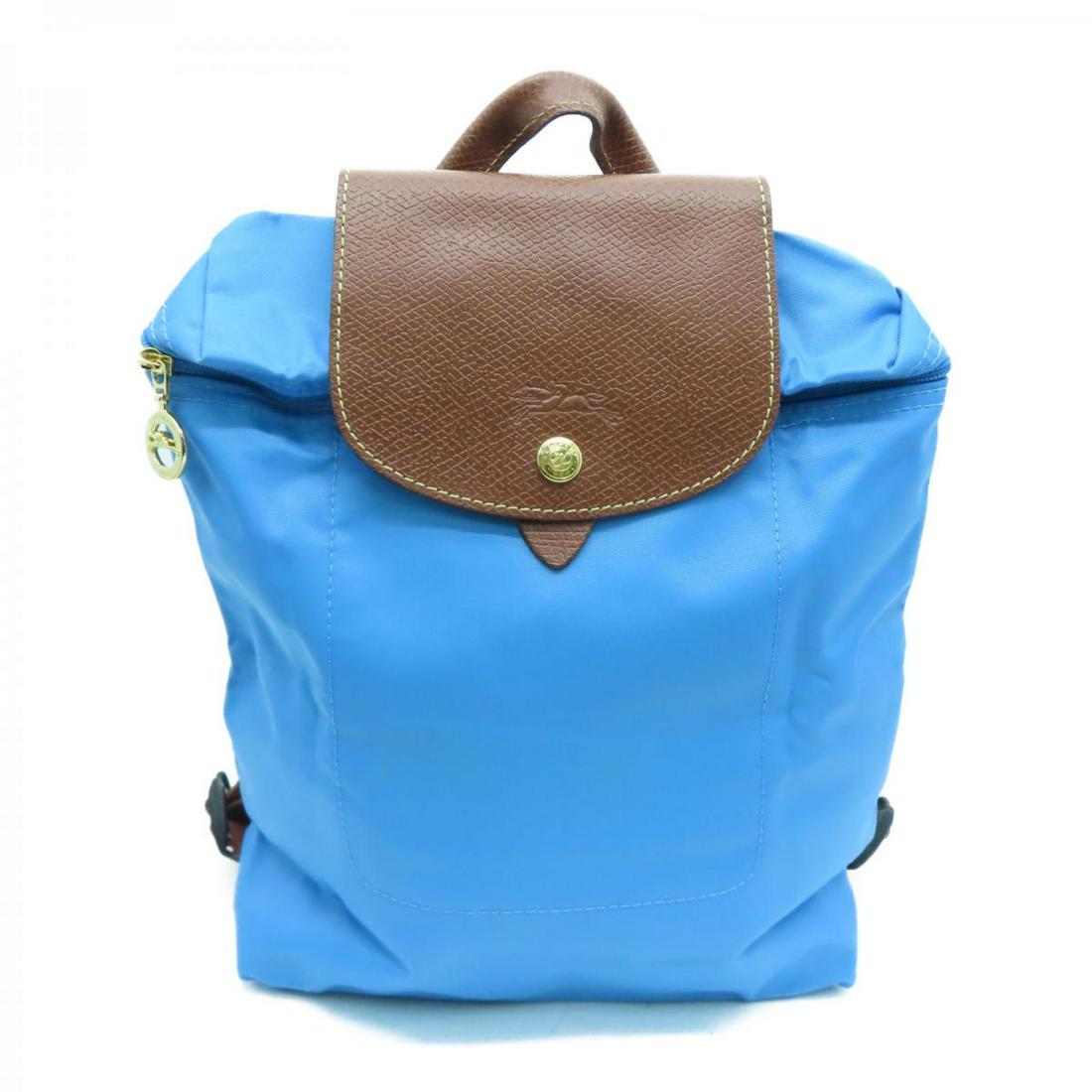 LONGCHAMP Backpack Blue Nylon: LONGCHAMP Backpack Blue Nylon Brand: LONGCHAMP Model: LONGCHAMP Backpack Blue Nylon Category: Women:Handbag Color: Blue Dimensions: H:26cm x W:23.5cm x D:10cm / 1699089-807 The BIDHAUS Guarantee: All 
