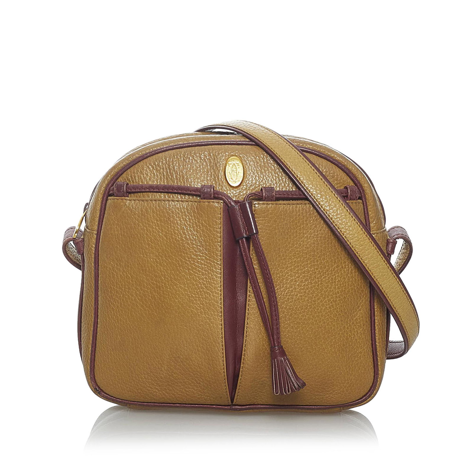Must de Cartier Leather Crossbody Bag: Must de Cartier Leather Crossbody Bag This crossbody bag features a leather body an adjustable flat shoulder strap an exterior front open pocket a drawstring detail with a tassel pull a top zip closur