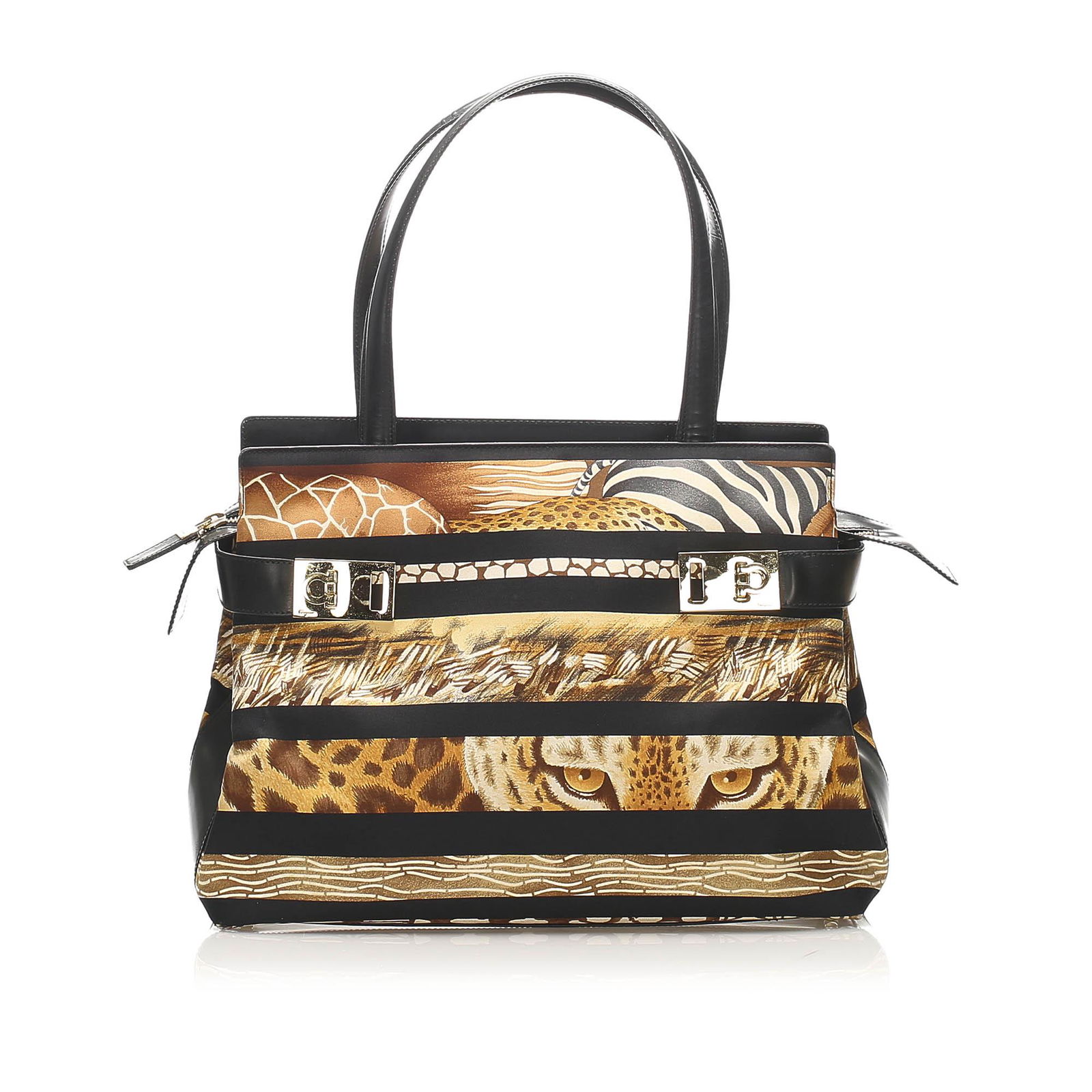 Ferragamo Gancini Fiera Carnival Canvas Tote Bag: Ferragamo Gancini Fiera Carnival Canvas Tote Bag The Fiera Carnival tote bag features a canvas body with leather trim flat leather handles and an open top. Brand: Ferragamo Model: Gancini Fiera Carniv