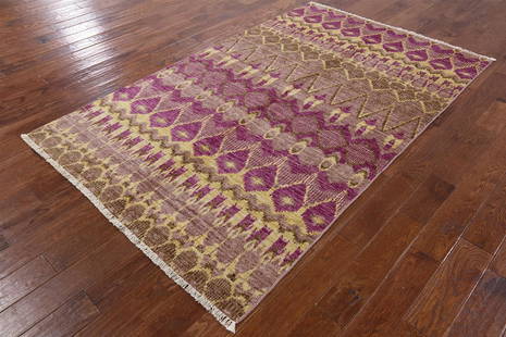 Ikat Hand Knotted Wool Rug 5' 1" X 8' 3": Ikat Hand Knotted Wool Rug 5' 1" X 8' 3" Design: Tribal Exact Size: 5\ 1 X 8\ 3 Style: Ikat Foundation: Cotton Pile: Wool Weave: Hand-knotted Age: New The BIDHAUS Guarantee: All items in this