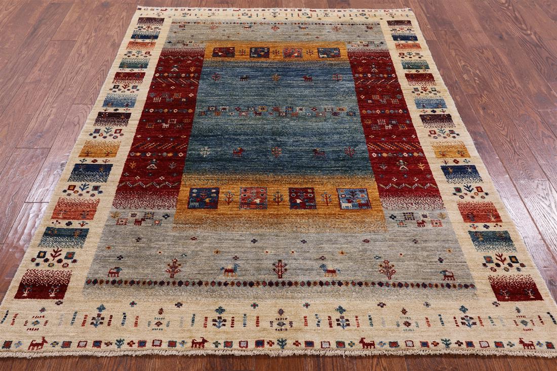 Hand-Knotted Persian Gabbeh Tribal Rug 4' 10" X 6' 7": Hand-Knotted Persian Gabbeh Tribal Rug 4' 10" X 6' 7" Design: Tribal Exact Size: 4\ 10 X 6\ 7 Style: Super Gabbeh Foundation: Cotton Pile: Wool Weave: Hand-knotted Age: New The BIDHAUS Guarantee: All