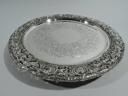 George V Tray Antique Renaissance Footed Salver English Sterling Silver: George V Tray Antique Renaissance Footed Salver English Sterling Silver George V sterling silver tray. Made by Mappin & Webb in London in 1920. Round well with engraved wreath (center vacant).