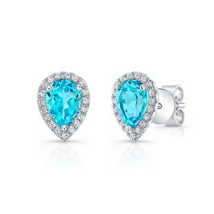 Blue Topaz And Diamond Halo Teardrop Earrings In 14k White Gold 0.18ctw: Blue Topaz And Diamond Halo Teardrop Earrings In 14k White Gold 0.18ctw Gorgeous Pear-shape Blue Topaz Halo Earring Features 7x5mm Blue Topaz Surrounded By 0.18ctw Of Round Brilliant Diamonds In 14k