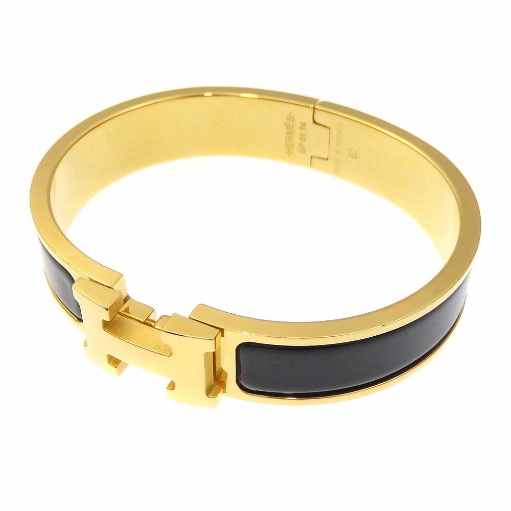 Hermes Bracelet Click Crack PM Ladies GP Black Bangle H700001FP84: Hermes Bracelet Click Crack PM Ladies GP Black Bangle H700001FP84 Brand: Hermes Line: Clic Type: Charm bracelet Gender: Women Finish: Gold plated Color: Black Length: 16cm / 6.29 Width: 1.2cm / 0.47 O