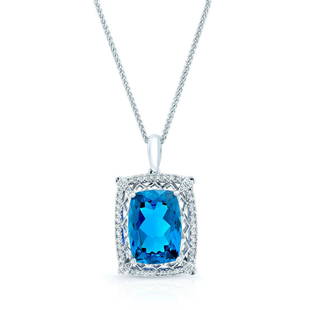 London Blue Topaz And Diamond Pendant In 18k White Gold (14x10mm): London Blue Topaz And Diamond Pendant In 18k White Gold (14x10mm) The Elegantly Polished 18k White Gold Of This Pendant And Attached Necklace Adds Style And Beauty To This Jewelry. The Pendant