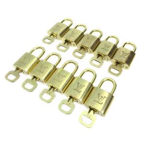 LOUIS VUITTON Padlock & Key Bag Accessories Charm 10 Piece Set Gold: LOUIS VUITTON Padlock & Key Bag Accessories Charm 10 Piece Set Gold Country/Region of Manufacture: France Department: Unisex Type: Padlock Color: Gold Brand: LOUIS VUITTON AB: Very Good The