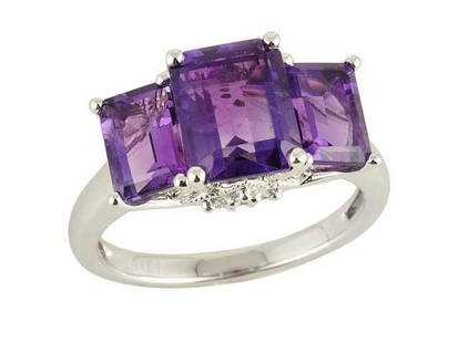 Amethyst And Diamond Emerald Cut 3 Stone Ring In 14k White Gold: Amethyst And Diamond Emerald Cut 3 Stone Ring In 14k White Gold This Elegant Three Stone Amethyst And Diamond Ring Features 3 Bold Emerald Cut Gemstones Accented With Sparkling Round Brilliant