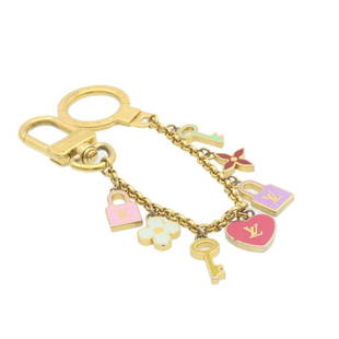 LOUIS VUITTON Porte Cles Chainne Pretty Charm Gold Multicolor M66131: LOUIS VUITTON Porte Cles Chainne Pretty Charm Gold Multicolor M66131 Brand: LOUIS VUITTON Style: Charm Material: Metal Color: Gold / Multicolor Size: See Description Bag Length: 8.5inch(Approx) /