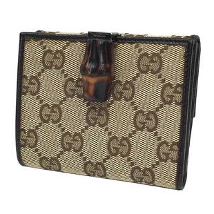 GUCCI Gucci GG canvas fold wallet (coin purse) beige x dark brown WG: GUCCI Gucci GG canvas fold wallet (coin purse) beige x dark brown WG Brand: Gucci Line: Bamboo Country of Origin: Italy Type: Wallet (bi-fold) Material: GG canvas Leather GG canvas: Leather: