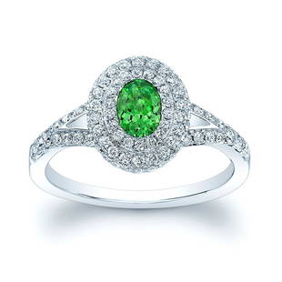 Tsavorite And Diamond Double Halo Ring In 14k White Gold: Tsavorite And Diamond Double Halo Ring In 14k White Gold This Elegant Double Halo Gemstone Ring Features An Oval Tsavorite Bezel Set Center And Is Surrounded By 0.60ctw Round Brilliant Vs Diamonds 