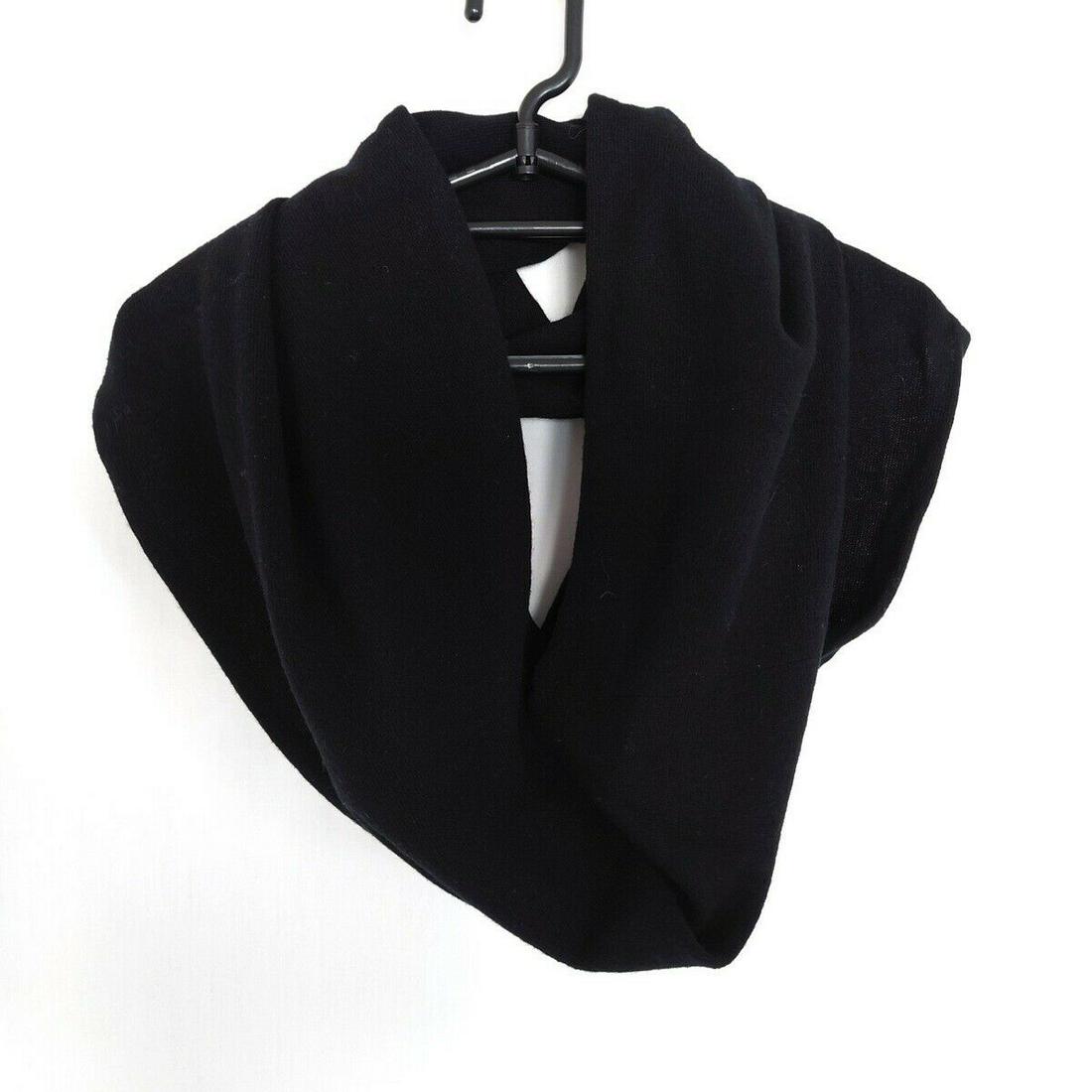 DKNY Black Wool Cashmere: DKNY Black Wool Cashmere Brand: DKNY Style: Scarf Color: Black Material: Wool Cashmere Type: Scarf B: Reasonable Wear and Tears The BIDHAUS Guarantee: All items in this auction are guaranteed authenti