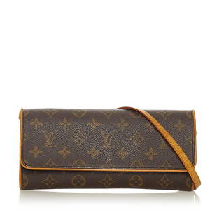 Louis Vuitton Monogram Pochette Twin GM Crossbody: Louis Vuitton Monogram Pochette Twin GM Crossbody The Pochette Twin GM features a monogram canvas body a flat leather strap a front flap with a magnetic closure and an interior slip pocket. 