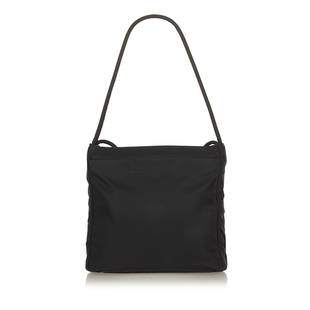 Prada Tessuto Tote Bag: Prada Tessuto Tote Bag This tote bag features a nylon body rolled straps an open top an interior compartment and interior zip and slip pockets. Brand: Prada Model: Tessuto Tote Bag Origin: