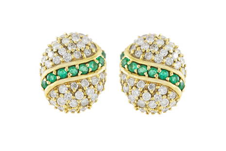 Egg-Shaped Clip-On Earrings: Egg-Shaped Clip-On Earrings The clip-on earrings are finely crafted in 18k yellow gold with diamonds weighing approximately a total of 2.14 and emeralds of 1.00 carat. Circa 1930. The BIDHAUS