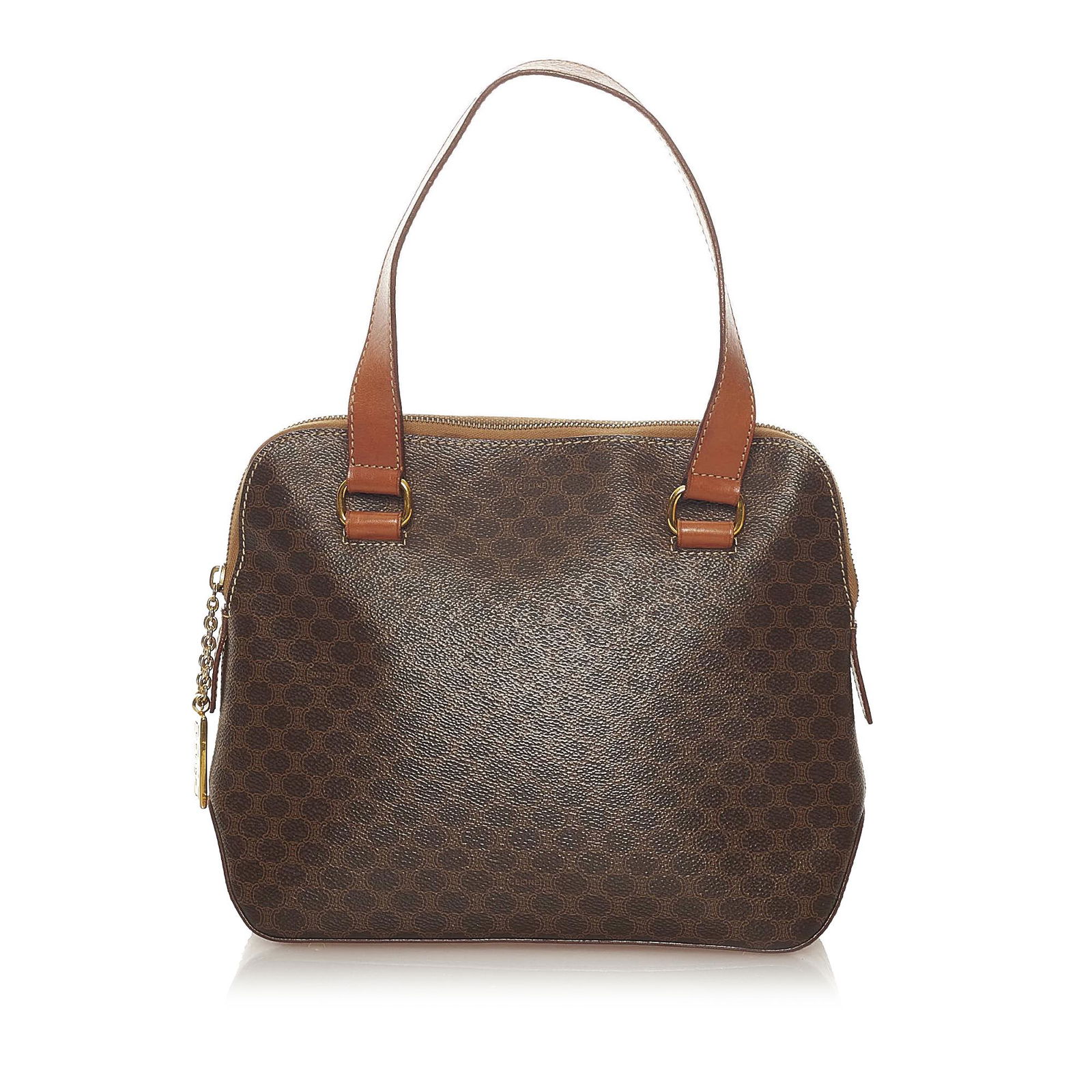 Celine Macadam Handbag: Celine Macadam Handbag This handbag features a PVC body with leather trim flat leather straps a top zip closure and interior zip and slip pockets. Brand: Celine Model: Macadam Handbag Origin: France C