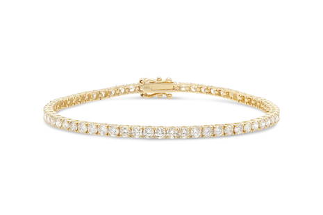 4.62 Carat Diamond Tennis Bracelet in 14k Yellow Gold: 4.62 Carat Diamond Tennis Bracelet in 14k Yellow Gold Finely crafted in 14k yellow gold with 64 round brilliant cut diamonds weighing a total of 4.62 carats.4 prong-set.7 inches long The BIDHAUS