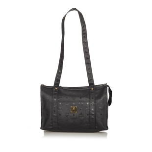 MCM Visetos Nylon Shoulder Bag: MCM Visetos Nylon Shoulder Bag This shoulder bag features a nylon body an exterior front slip pocket flat straps a top zip closure and an interior zip pocket. Brand: MCM Model: Visetos Nylon