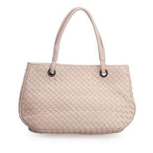 Bottega Veneta Intrecciato Leather Handbag: Bottega Veneta Intrecciato Leather Handbag This handbag features a woven leather body rolled leather handles a top magnetic snap button closure and interior zip and slip pockets. Brand: Bottega