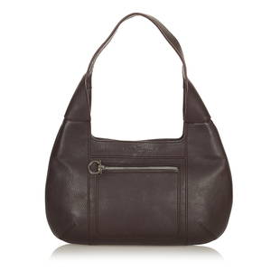 Ferragamo Gancini Leather Hobo Bag: Ferragamo Gancini Leather Hobo Bag This shoulder bag features a leather body an exterior front zip pocket a flat strap a top magnetic snap button closure and an interior zip pocket. Brand: