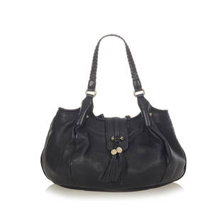 Gucci Marrakech Leather Hobo Bag: Gucci Marrakech Leather Hobo Bag This hobo bag features a leather body flat braided straps a top strap with magnetic closure and interior zip and slip pockets. Brand: Gucci Model: Marrakech