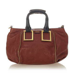 Chloe Ethel Leather Satchel: Chloe Ethel Leather Satchel The Ethel features a leather body rolled handles a detachable strap gold-tone hardware a top magnetic snap button closure and an interior zip pocket. Brand: Chloe