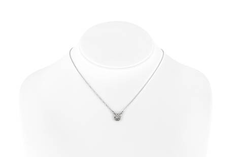 Diamond Platinum Pendant-Necklace: Diamond Platinum Pendant-Necklace The necklace is finely crafted in platinum and 14k white gold with diamonds weighing approximately total of 0.80 carat. Circa 1970. The BIDHAUS Guarantee: All