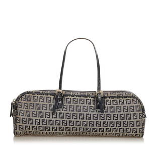 Fendi Zucchino Canvas Handbag: Fendi Zucchino Canvas Handbag This handbag features a canvas body with leather trim flat leather handles a top zip closure and interior zip and slip pockets. Brand: Fendi Model: Zucchino Canvas