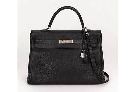 Hermes Kelly 35 Retourne Black Togo PH: Hermes Kelly 35 Retourne Black Togo PH Condition: Excellent Era: Contemporary; 2000s Dimensions: 13.5" L x 5" W x 10" H Materials: leather metal Color: black palladium Hermes 35 cm black Togo