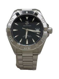 TAG Heuer Aqua racer WAY 2110 Calibre 5 Self-winding Analog Men's Watch: TAG Heuer Aqua racer WAY 2110 Calibre 5 Self-winding Analog Men's Watch Brand: Tag Heuer Type: Wristwatch Department: Mens Pre-Owned The BIDHAUS Guarantee: All items in this auction are