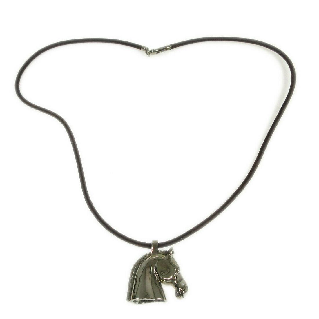 HERMES BIJOUTERIE FANTAISIE Horse Motif Pendant Necklace Silver Brown: HERMES BIJOUTERIE FANTAISIE Horse Motif Pendant Necklace Silver Brown Shape: Horse Country/Region of Manufacture: Unknown Style: Necklace Length (inches): 23.6 Material: Leather Color: Silver Brown Br