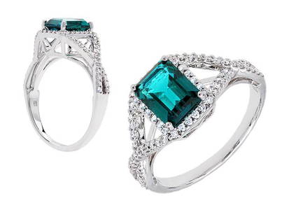 Created Emerald And Diamond Infinity Twist Ring In 18k White Gold: Created Emerald And Diamond Infinity Twist Ring In 18k White Gold This Stunning Infinity Twist Gemstone Ring Showcase An Emerald Cut Created Emerald Center With Pave Set 0.33 Ctw Round Brilliant Vs