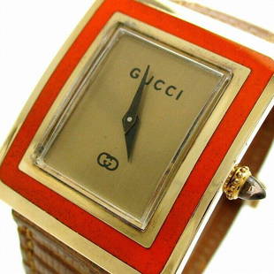 Gucci Rectangular Manual Winding Enamel Cloisonne Orange Ladies Watch: Gucci Rectangular Manual Winding Enamel Cloisonne Orange Ladies Watch Brand: Gucci Type: Wristwatch Department: Womens Pre-Owned The BIDHAUS Guarantee: All items in this auction are guaranteed