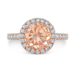 Morganite And Diamond Round Halo Ring With Pave Shank In 18k Rose Gold (8mm): Morganite And Diamond Round Halo Ring With Pave Shank In 18k Rose Gold (8mm) Gorgeous Round Halo Ring With Pave Shank Features An 8mm Morganite Accented By 0.65ctw Of Round Brilliant Diamonds Set In
