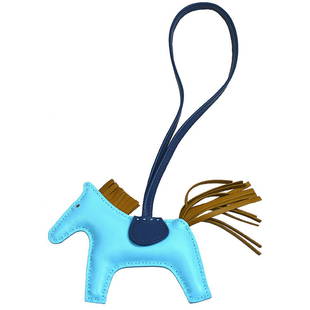 HERMES Acc De Sac Rodeo PM Agneau Milo Bag Charm Blue Aztec DAM: HERMES Acc De Sac Rodeo PM Agneau Milo Bag Charm Blue Aztec DAM Country/Region of Manufacture: France Department: Women Material: Agneau Milo Type: Handbag Charm Color: Blue Aztec Brand: HERMES A: