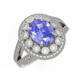 4.76 ctw Certified Tanzanite & Diamond Victorian Ring 14K White Gold: 4.76 ctw Certified Tanzanite & Diamond Victorian Ring 14K White Gold 4.76 ctw Certified Tanzanite & Diamond Victorian Ring 14K White Gold Designer Brand Luxury Jewelrymade in the USA Suggested