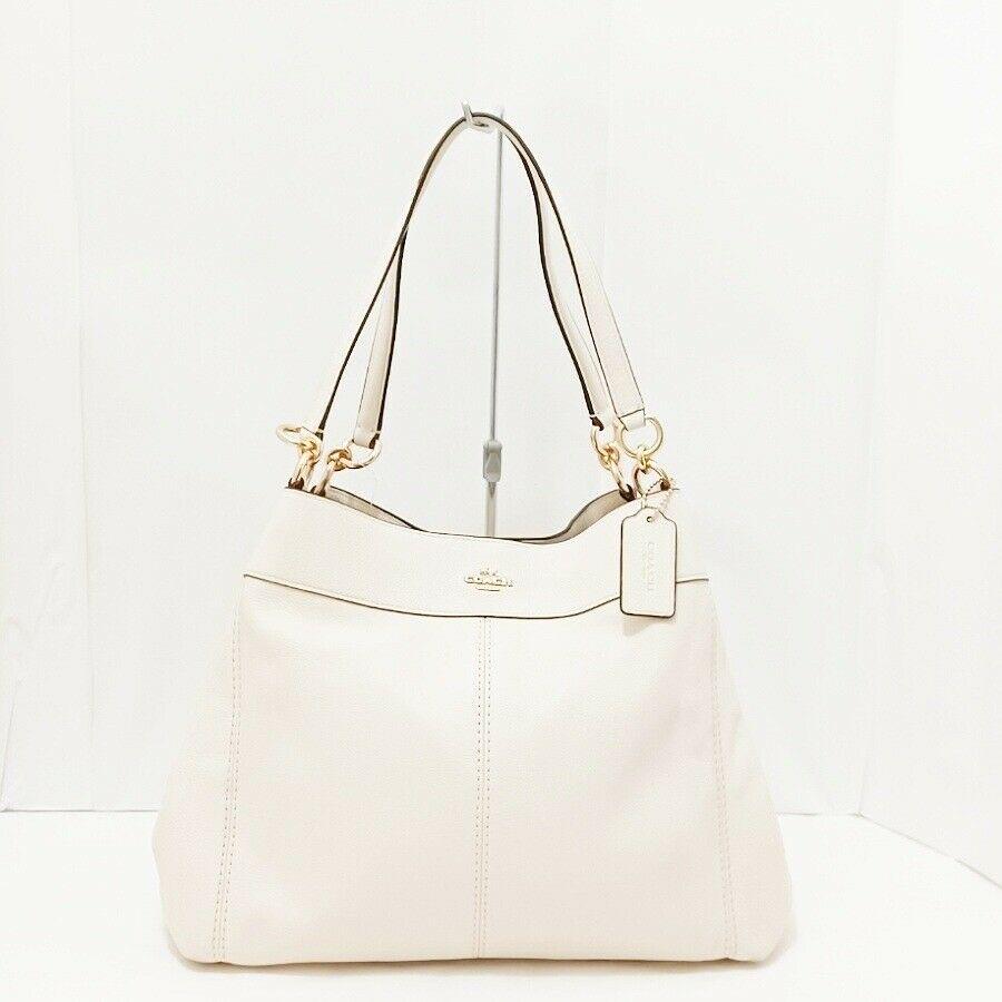COACH F57545 Cream Leather Shoulder: COACH F57545 Cream Leather Shoulder Brand: COACH Style: Shoulder Bag Exterior Color: Cream Exterior Material: Leather Model Number: F57545 Department: Women Type: Shoulder Bag B: Reasonable Wear and T