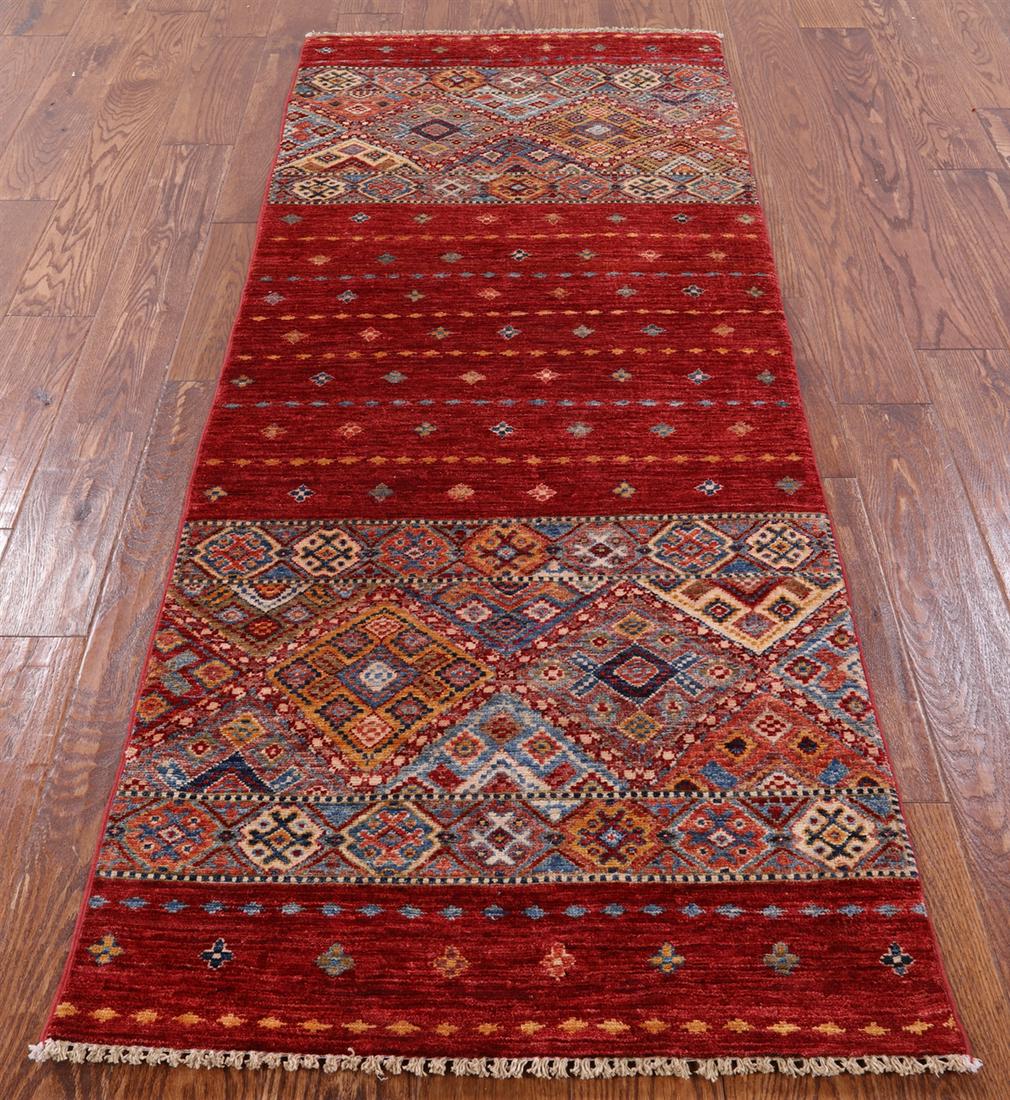 2' 6" X 6' 6" Runner Khorjin Super Kazak Hand Knotted Rug: 2' 6" X 6' 6" Runner Khorjin Super Kazak Hand Knotted Rug Design: Traditional Exact Size: 2\ 6 X 6\ 6 Style: Super Kazak Foundation: Cotton Pile: Wool Weave: Hand-knotted Age: New The BIDHAUS Guarante