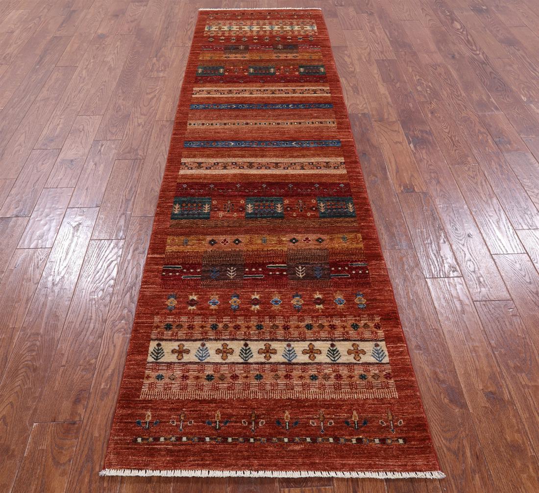 Runner Handmade Tribal Persian Gabbeh Rug 2' 8" X 10' 0": Runner Handmade Tribal Persian Gabbeh Rug 2' 8" X 10' 0" Design: Tribal Exact Size: 2\ 8 X 10\ 0 Style: Gabbeh Foundation: Cotton Pile: Wool Weave: Hand-knotted Age: New The BIDHAUS Guarantee: All ite