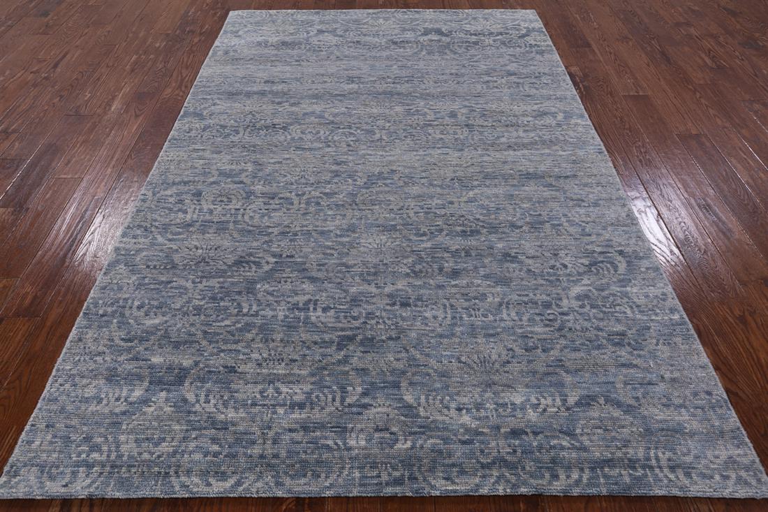 Handmade Modern Wool Rug 6' 0" X 9' 0": Handmade Modern Wool Rug 6' 0" X 9' 0" Design: Floral Exact Size: 6\ 0 X 9\ 0 Style: Modern Foundation: Cotton Pile: Wool Weave: Hand-knotted Age: New The BIDHAUS Guarantee: All items in this auction