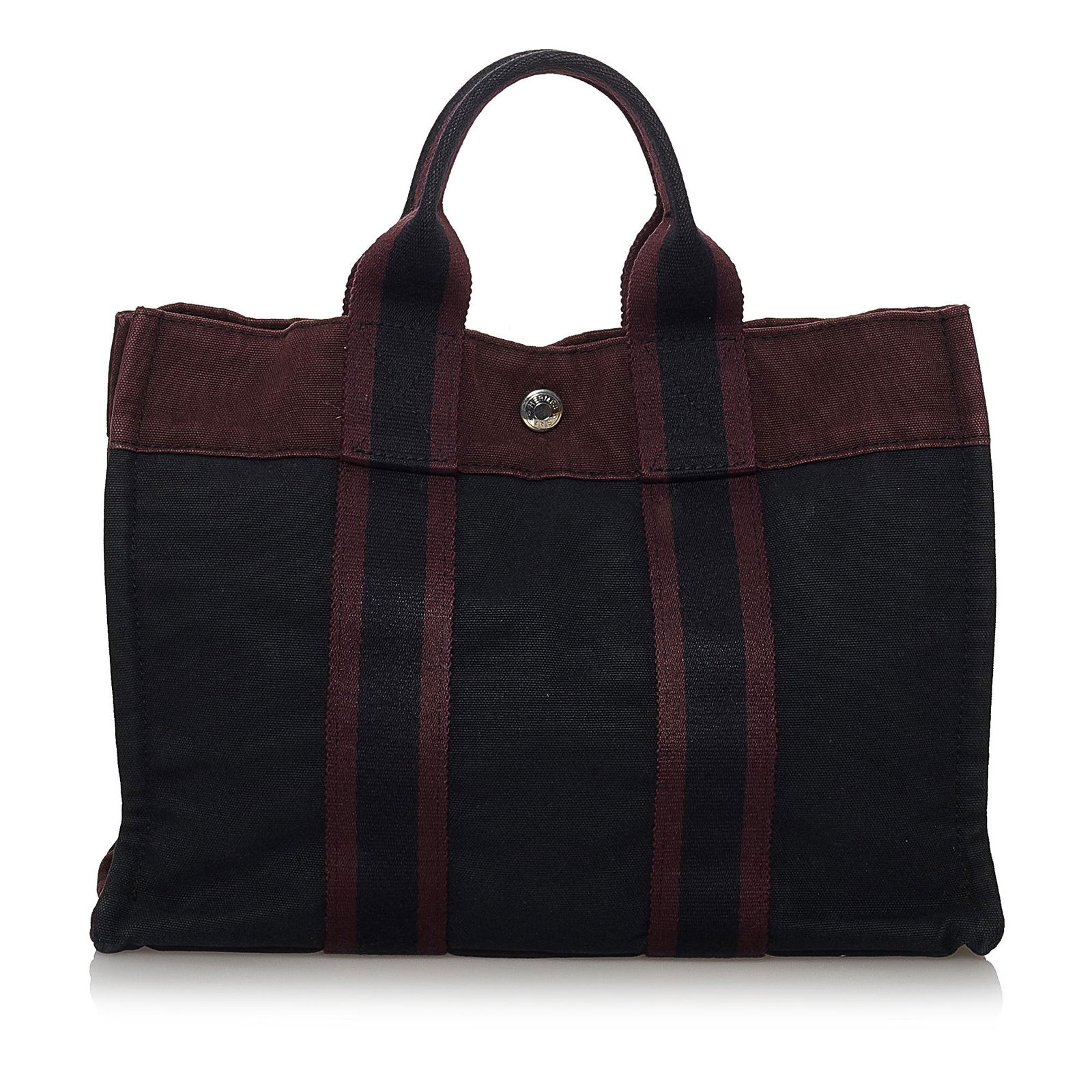Hermes Fourre Tout PM: Hermes Fourre Tout PM The Fourre Tout PM tote features a canvas body flat straps an open top with a snap closure and an interior zip compartment. Brand: Hermes Model: Fourre Tout PM Origin: France Cat