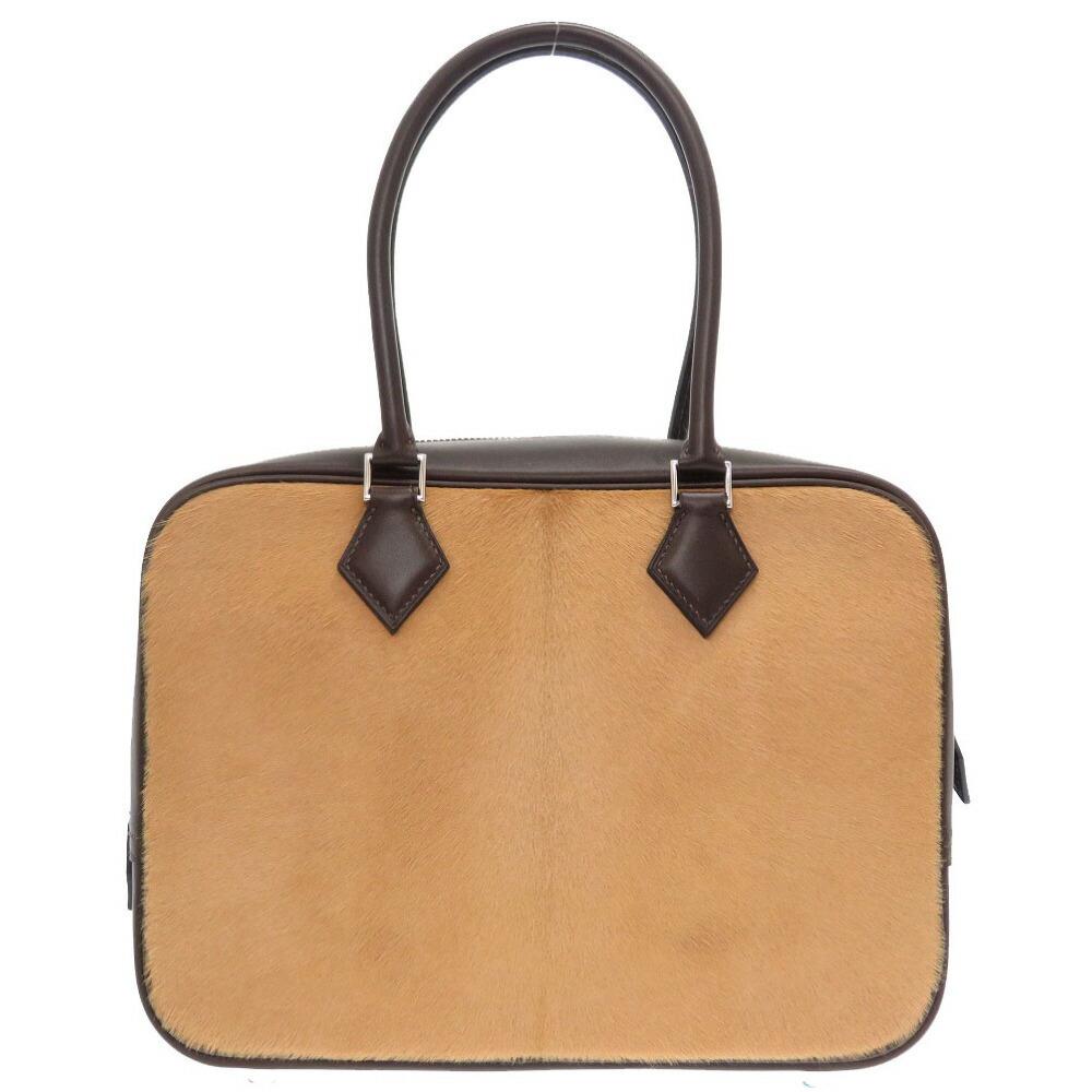 Hermes Plum 28 Harako Chamony Evenne # K engraved handbag bag tea 0026 HERMES: Hermes Plum 28 Harako Chamony Evenne # K engraved handbag bag tea 0026 HERMES Brand: Hermes Line: Plume Country of Origin: France Type: Handbag Closure: Zipper Inner Pocket: Open pocket3 Open pocket: