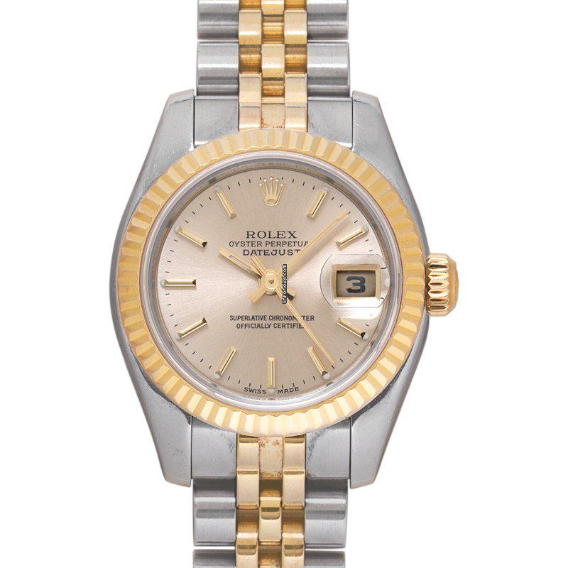 Rolex Lady Oyster Perpetual Champagne/18k gold O26 mm - 179173: Rolex Lady Oyster Perpetual Champagne/18k gold O26 mm - 179173 Brand: Rolex Model: Lady-Datejust Dealer product code: 84630B Movement: Automatic Case material: Steel Year of production: 2006 Condition