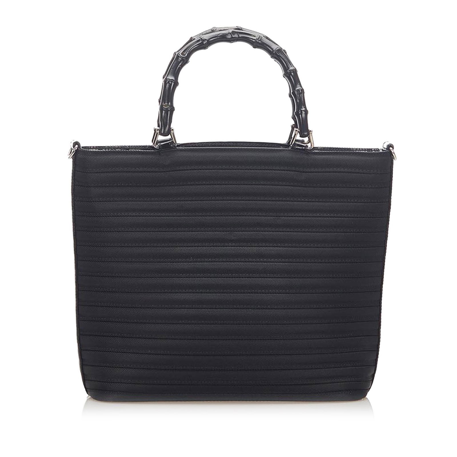 Gucci Bamboo Canvas Satchel: Gucci Bamboo Canvas Satchel The Bamboo handbag features a canvas body bamboo handles a detachable flat strap a top zip closure and an interior zip pocket. Brand: Gucci Model: Bamboo Canvas Satchel Ori