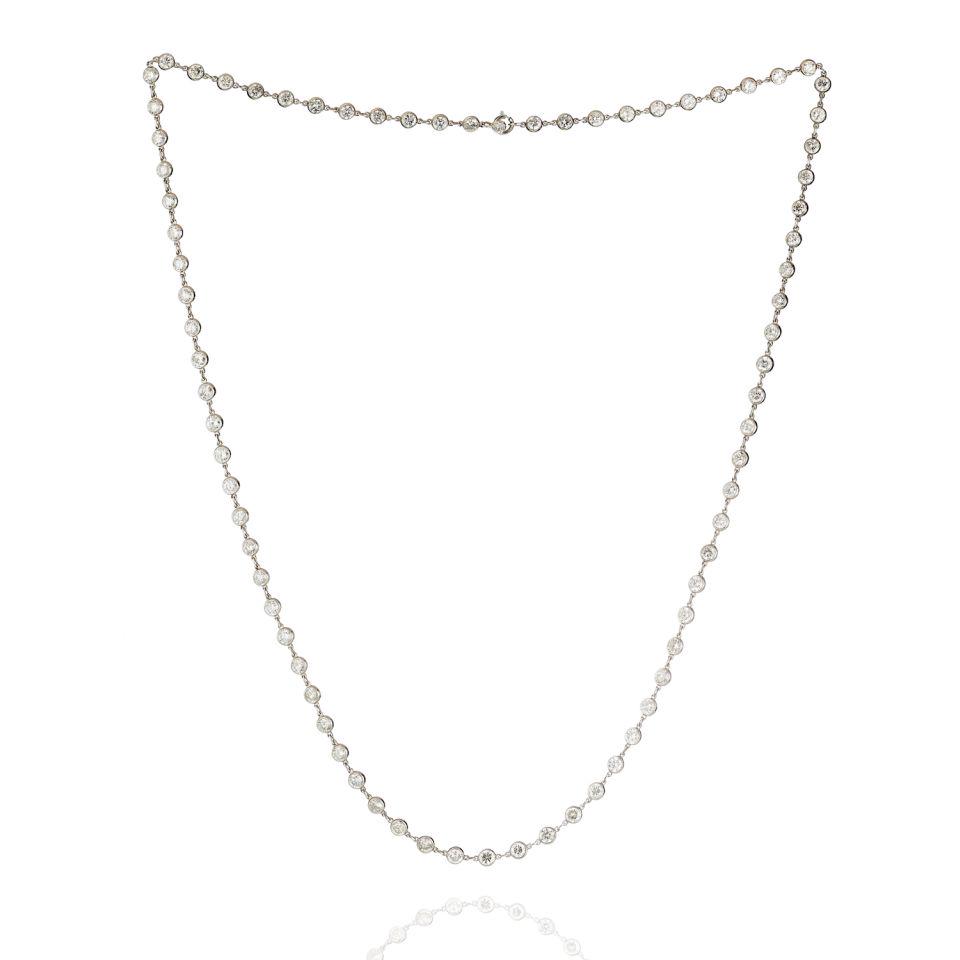 Platinum 12 carat Round Cut Diamonds by the Yard Necklace: Platinum 12 carat Round Cut Diamonds by the Yard Necklace Type: Diamonds By The Yard Metal: Platinum Grams: 13.5 Exact Diamond Weight: 12 Cts Measurements: L: 22 inches. Condition: Excellent. Other De